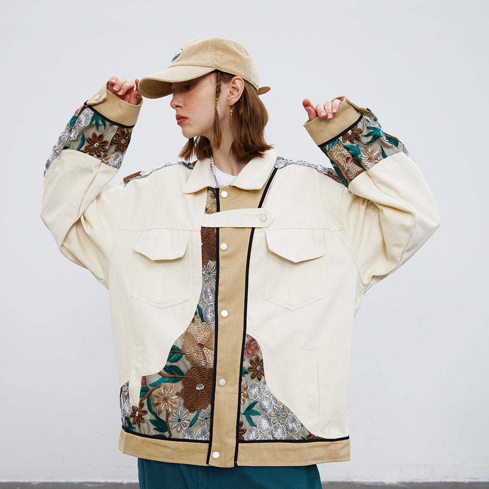 Person wearing a beige and floral-patterned jacket with matching cap on a white background