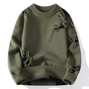 Green distressed sweater on a white background