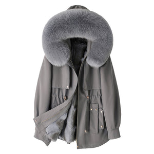 Gray parka coat with fur-lined hood on a white background