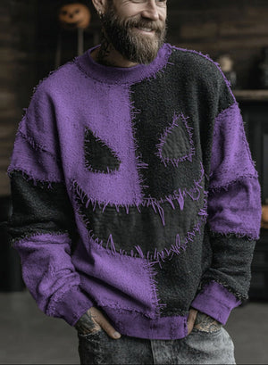 Person wearing a purple and black sweater with a jack-o'-lantern design.