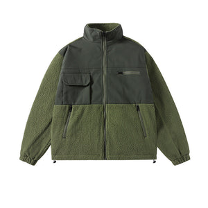Green jacket with a mix of textures on a white background