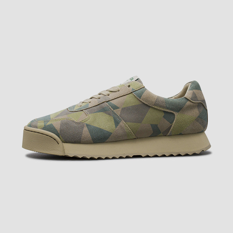 Camouflage-patterned sneaker on a light gray background