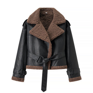 Black leather jacket with brown shearling collar and cuffs on a white background