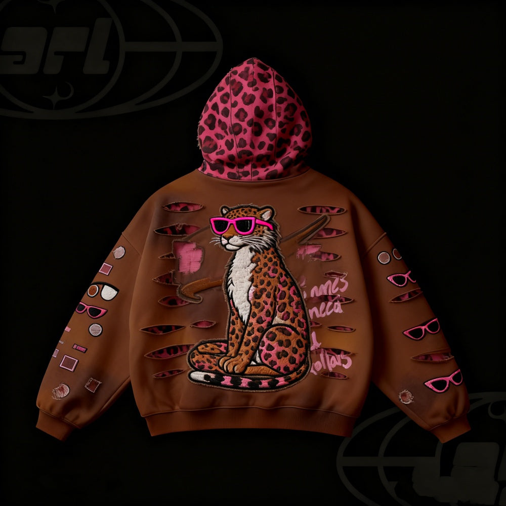 Brown hoodie with leopard graphic and pink sunglasses on a dark background
