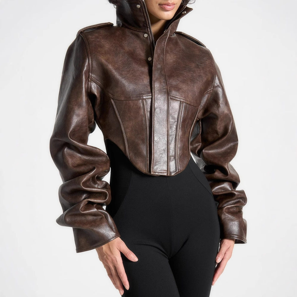Brown leather jacket worn by a person on a white background