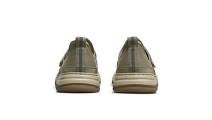 Beige slip-on shoes shown from front and back on a white background