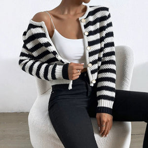 Cardigan Jacket - Striped Round Neck - MRC STOREJacketsMRC STOREA woman wearing a striped round neck cardigan jacket in black and white with long sleeves, buttoned at the front, over a white top and paired with black trousers.MRC STORECJMY231743203CXBlack And White Mixed ColorL