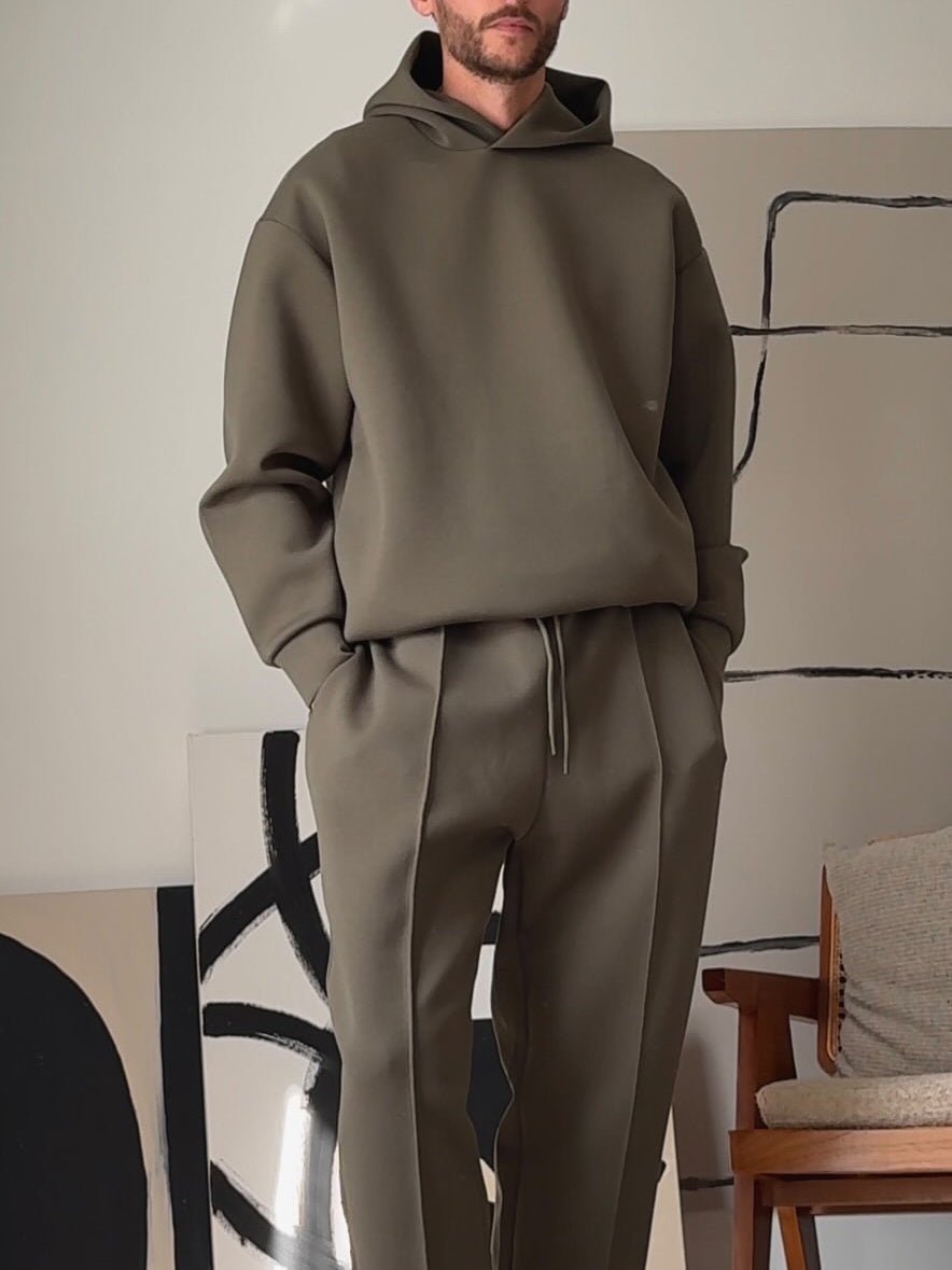 Casual Hooded Sweatshirt Elastic Waist Pants Set - MRC STOREsetMRC STOREPerson wearing a brown tracksuit standing in a room with abstract art on the wall.MRC STORECJMS246379705EVAS Show2XL