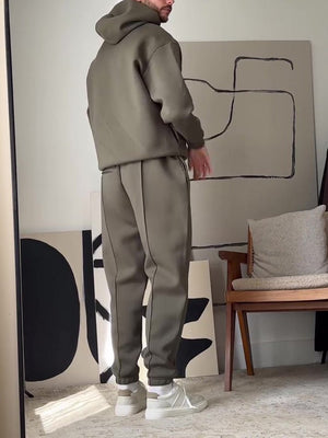 Casual Hooded Sweatshirt Elastic Waist Pants Set - MRC STOREsetMRC STOREPerson wearing a gray tracksuit standing in a room with abstract art on the wall.MRC STORECJMS246379705EVAS Show2XL