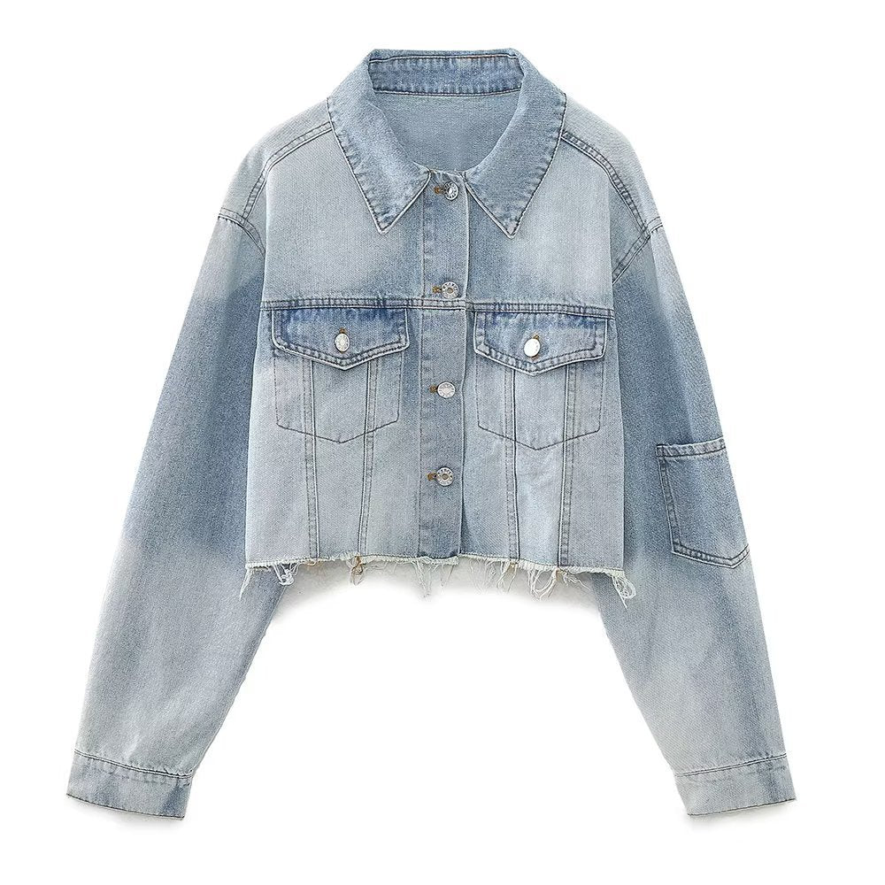 A women's short denim jacket with long sleeves, collar, and front pockets, displayed against a plain background.