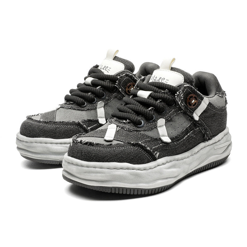 Pair of black and gray sneakers on a white background