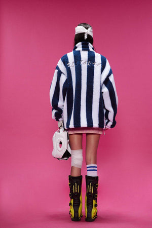 Lamb Wool Coat – Retro Plaid - MRC STOREJacketsMy StoreA woman wearing a blue and white striped plaid coat with a faux fur collar, oversized number print on the front, and paired with a pink skirt and white hat.MRC STORECJPK217128002BYBlue And White StripesL