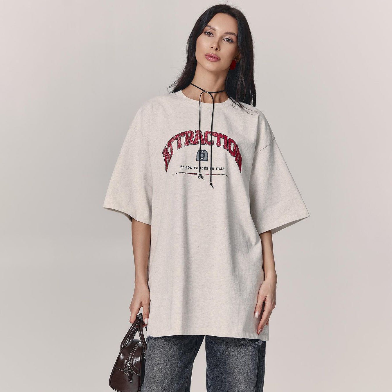 Letter T-Shirt - Loose Shoulder Printed Top - MRC STORET-ShirtsMy StoreWoman wearing a beige oversized t-shirt with text on a plain backgroundMRC STORECJCS204529003CXGray And WhiteL