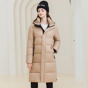 Long Hooded Winter Coat - MRC STOREJacketsMRC STOREA woman wearing a long black hooded winter coat with full - length sleeves and standing in a light - colored space.MRC STORECJWJ217303819SHKhakiL