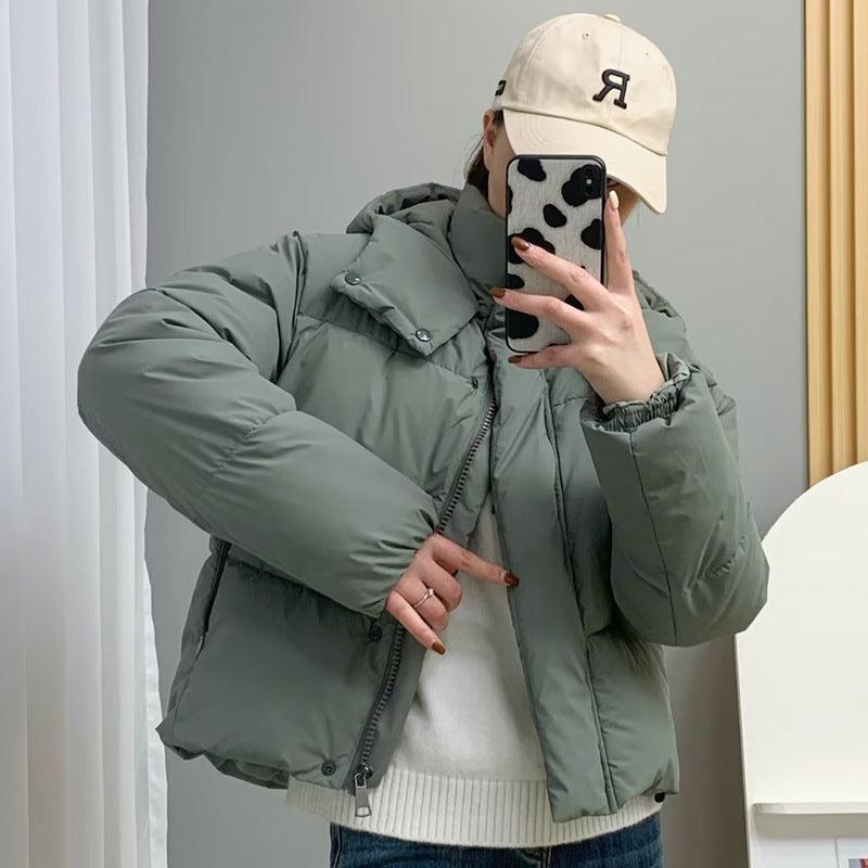 Thickened Cotton Padded Jacket – Loose Winter - MRC STOREJacketsMRC STORETwo cotton - padded jackets hanging on display, one in green and the other in black, both with a loose fit and no visible fur collar.MRC STORECJJK222682808HSArmy GreenL