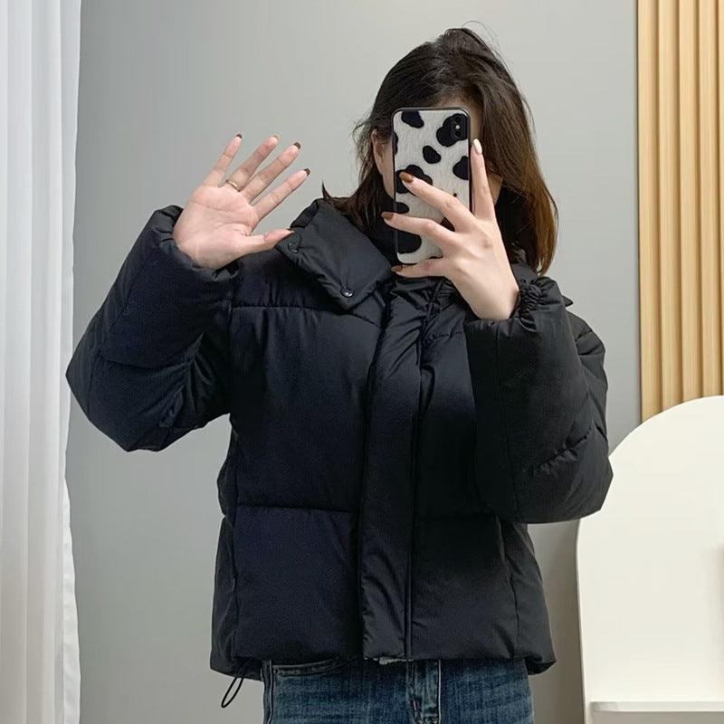 Thickened Cotton Padded Jacket – Loose Winter - MRC STOREJacketsMRC STORETwo cotton - padded jackets hanging on display, one in green and the other in black, both with a loose fit and no visible fur collar.MRC STORECJJK222682804DWBlackL