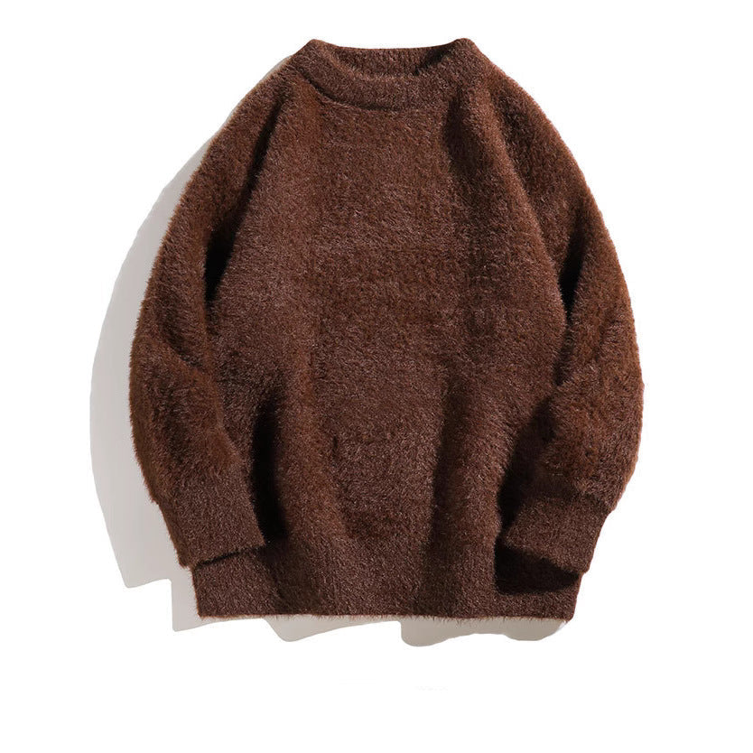 Brown fuzzy sweater on a white background