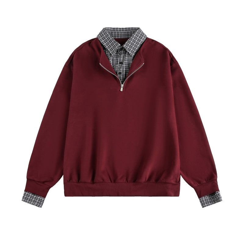 Maroon pullover with plaid collar and cuffs on a white background