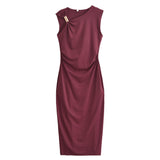 Maroon dress with a bow detail on a white background