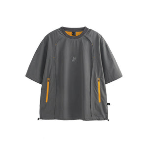 Gray short-sleeve shirt with yellow zippers on a white background