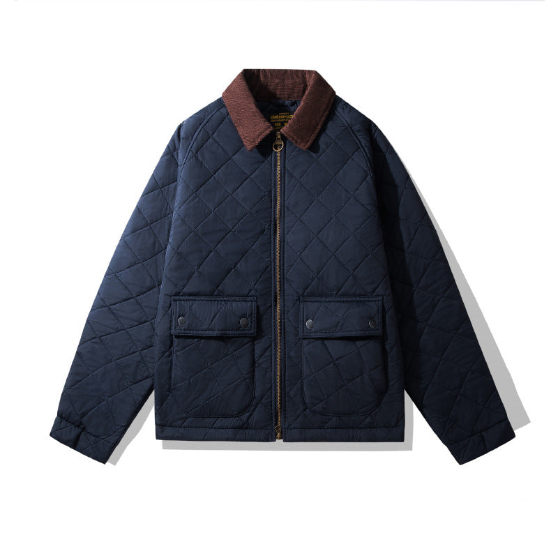 Navy quilted jacket with brown collar on a white background