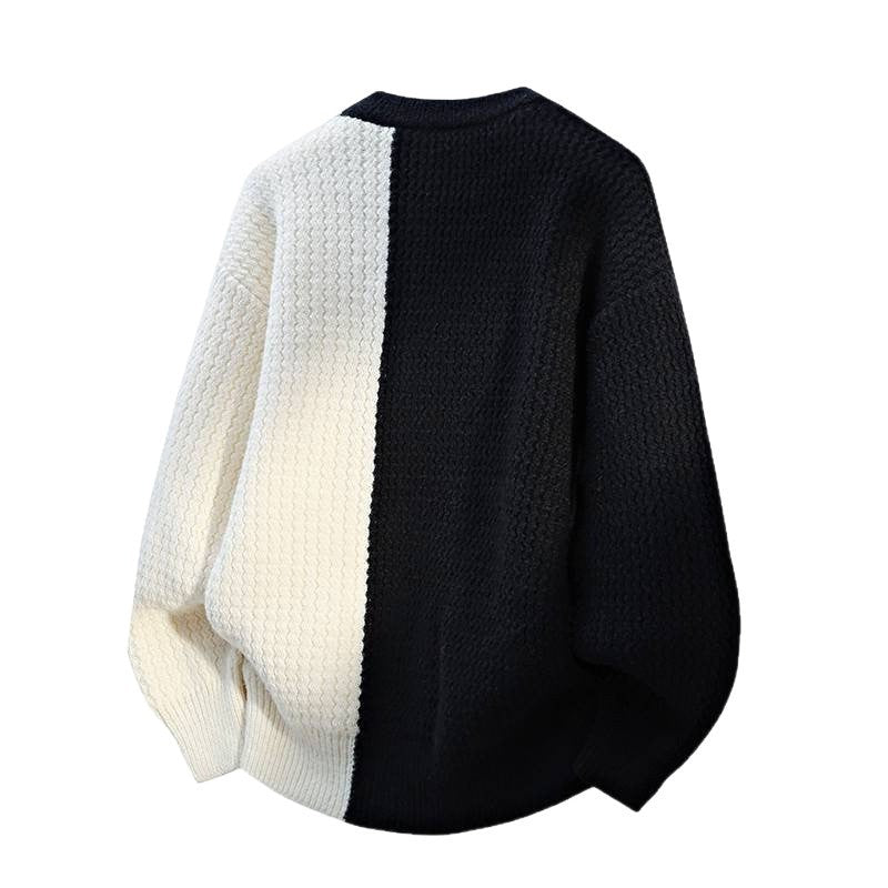 Black and white sweater on a white background