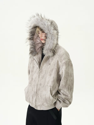 Person wearing a beige jacket with a fur-lined hood on a white background