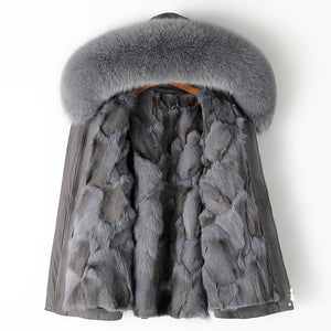 Gray fur vest with a hood on a white background