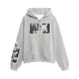 Gray hoodie with black and white graphic designs on a white background