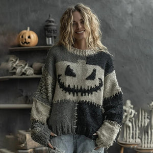 Person wearing a Halloween-themed sweater with a jack-o'-lantern design in a spooky setting.