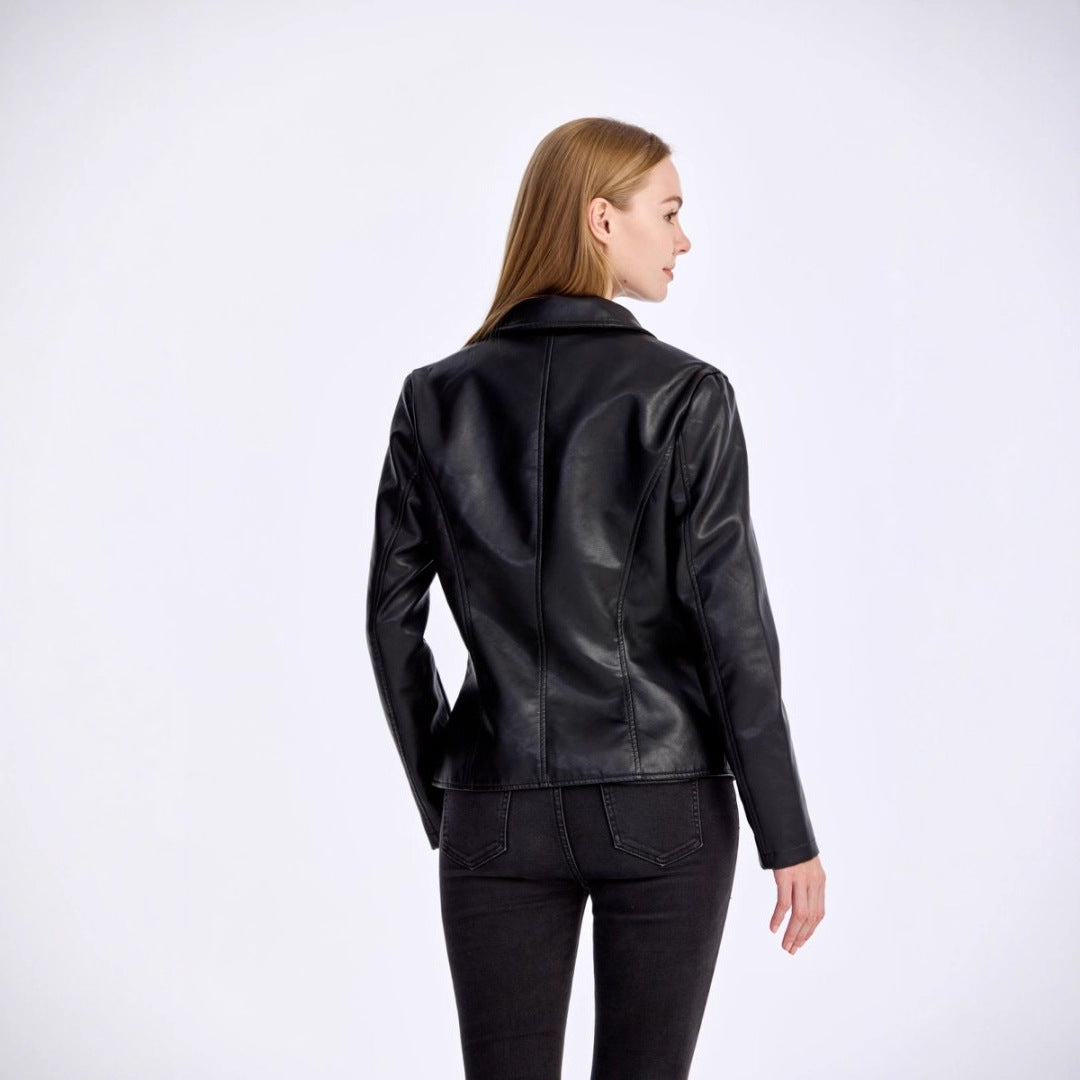 Woman wearing a black leather jacket on a white background