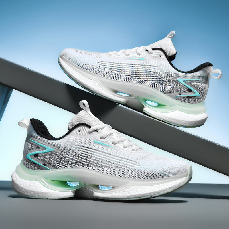 White and gray athletic shoes with green accents on a blue background