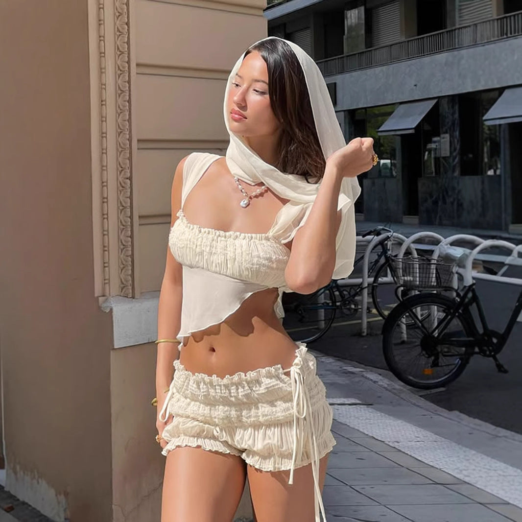 side angle view of women's high waist hot shorts with ruffled waistband – streetwear style