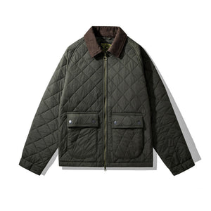 Quilted jacket with brown collar on a white background