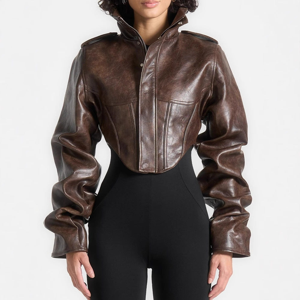 Brown leather jacket worn by a person on a white background