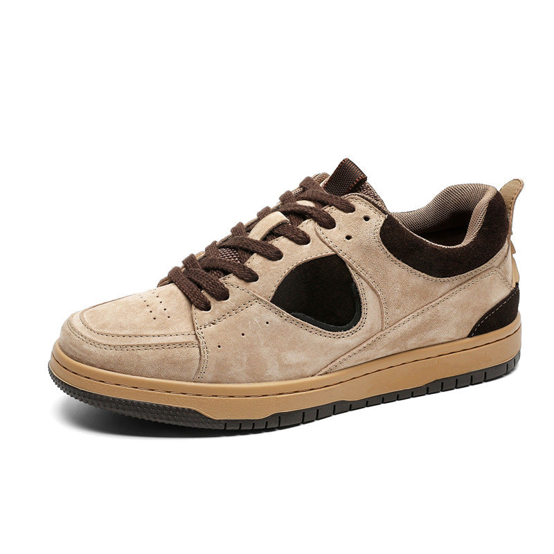 Beige sneaker with brown laces on a white background