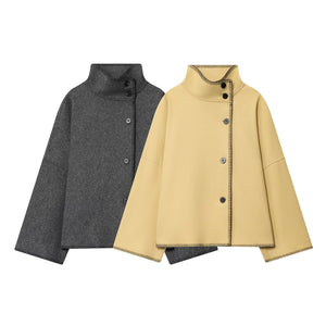 Two jackets, one gray and one beige, on a white background