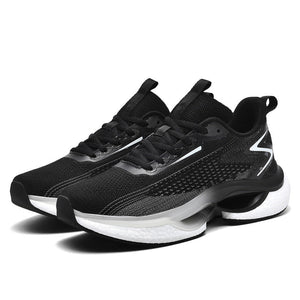 Black and white athletic shoes on a white background