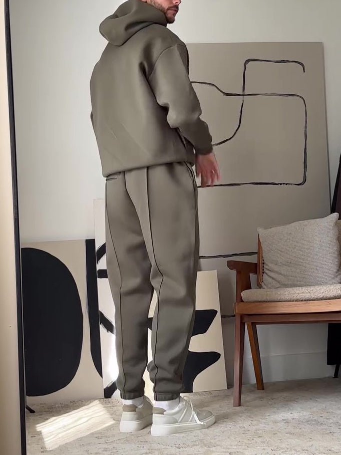 Casual Hooded Sweatshirt Elastic Waist Pants Set - MRC STOREsetMRC STOREPerson wearing a gray tracksuit standing in a room with abstract art on the wall.MRC STORECJMS246379705EVAS Show2XL