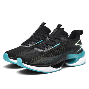 Black and teal running shoes on a white background