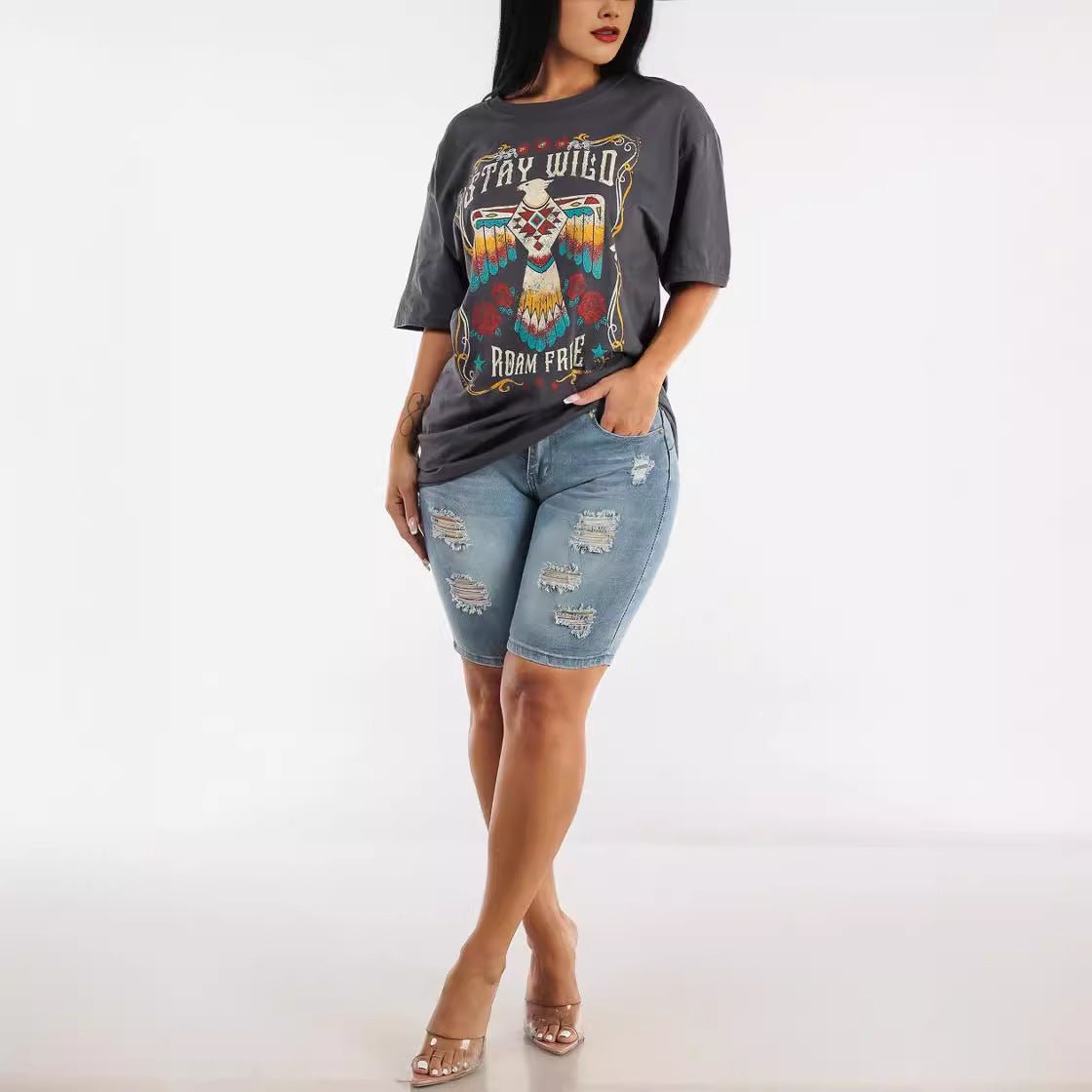 Denim Shorts - High Waist Ripped - MRC STOREShortsMy StoreA woman wearing a gray t-shirt with a graphic design and high - waisted ripped denim shorts.MRC STORECJNZ234136303CXBlueL