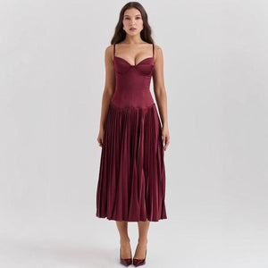 Elegant Spaghetti Strap Long Dress – Pleated, Slim Fit - MRC STOREDressMRC STOREA woman wearing a sleeveless, pleated, red maxi dress with spaghetti straps.MRC STORECJLY217733303CXRedL