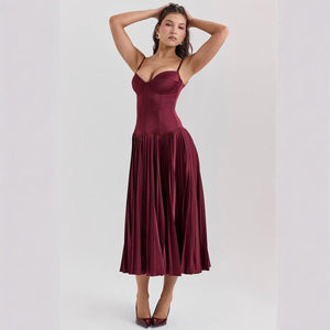Elegant Spaghetti Strap Long Dress – Pleated, Slim Fit - MRC STOREDressMRC STOREA woman wearing a sleeveless, pleated, red maxi dress with spaghetti straps.MRC STORECJLY217733303CXRedL