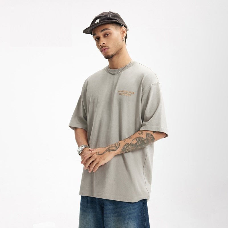 Embroidered T-Shirt - Retro Thread Collar - MRC STORET-ShirtsMy StoreA man wearing a gray short - sleeve men's embroidered t-shirt with a thread collar design, featuring retro letter embroidery on the front.MRC STORECJYH233219802BYGray BlueL