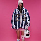 Lamb Wool Coat – Retro Plaid - MRC STOREJacketsMy StoreA woman wearing a blue and white striped plaid coat with a faux fur collar, oversized number print on the front, and paired with a pink skirt and white hat.MRC STORECJPK217128002BYBlue And White StripesL