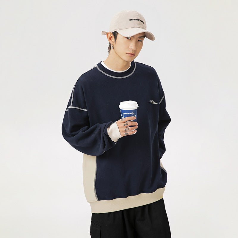 Loose Contrast Letter Sweatshirt - MRC STORESweaters & HoodiesMRC StorePerson wearing a navy sweater with white accents, holding a coffee cup against a plain backgroundMRC STORECJWY247178802BYApricotL