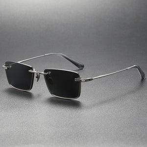 Polarized Sunglasses - UV - Proof Titanium - MRC STOREAccessoriesMy StoreA pair of women's polarized sunglasses with a black frame and grey lenses, displayed on a dark platform with a reflective surface.MRC STORECJCF201152101AZGun Frame Black And Gray
