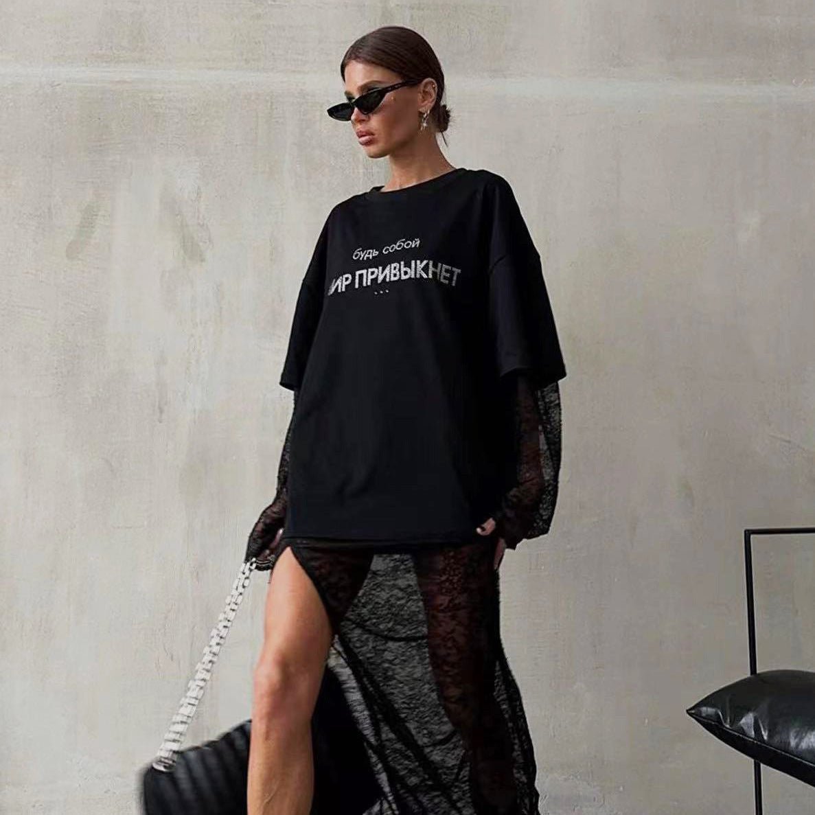 Rhinestone T-Shirt - Loose European Top - MRC STORET-ShirtsMy StoreWoman wearing a black oversized t-shirt with text, standing against a plain wall.MRC STORECJCS208242003CXT3786 BlackL