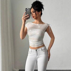 Sequined T-Shirt - Off - Shoulder Mesh - MRC STORET-ShirtsMy StoreA woman wearing an off - shoulder white mesh t-shirt with sequins and pleated details, paired with white trousers.MRC STORECJCS234122003CXWhiteL
