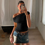 Sleeveless Top - Diagonal Collar Solid - MRC STORETopMy StoreA woman wearing a yellow sleeveless top with a diagonal collar, paired with a denim skirt and carrying a white purse.MRC STORECJCS235601506FUBlackL